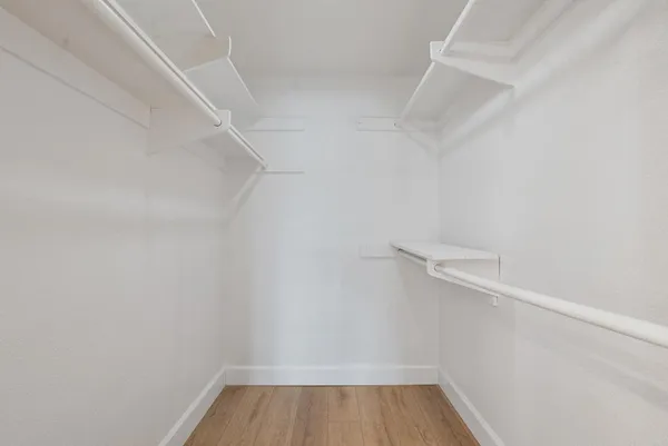 a view of a room with racks on the wall