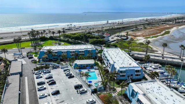 a view of city with ocean