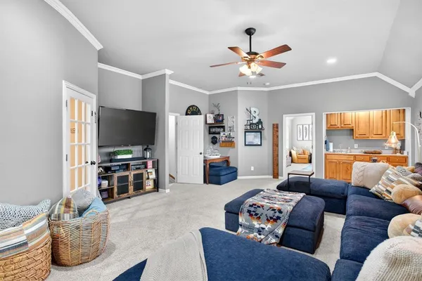 a bedroom with bed and a window