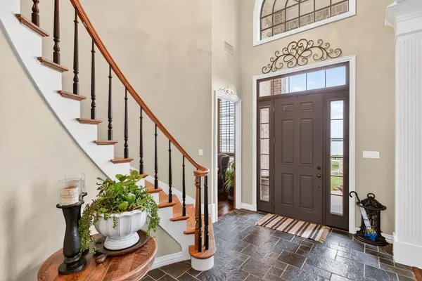 a living room with furniture fireplace and flat screen tv