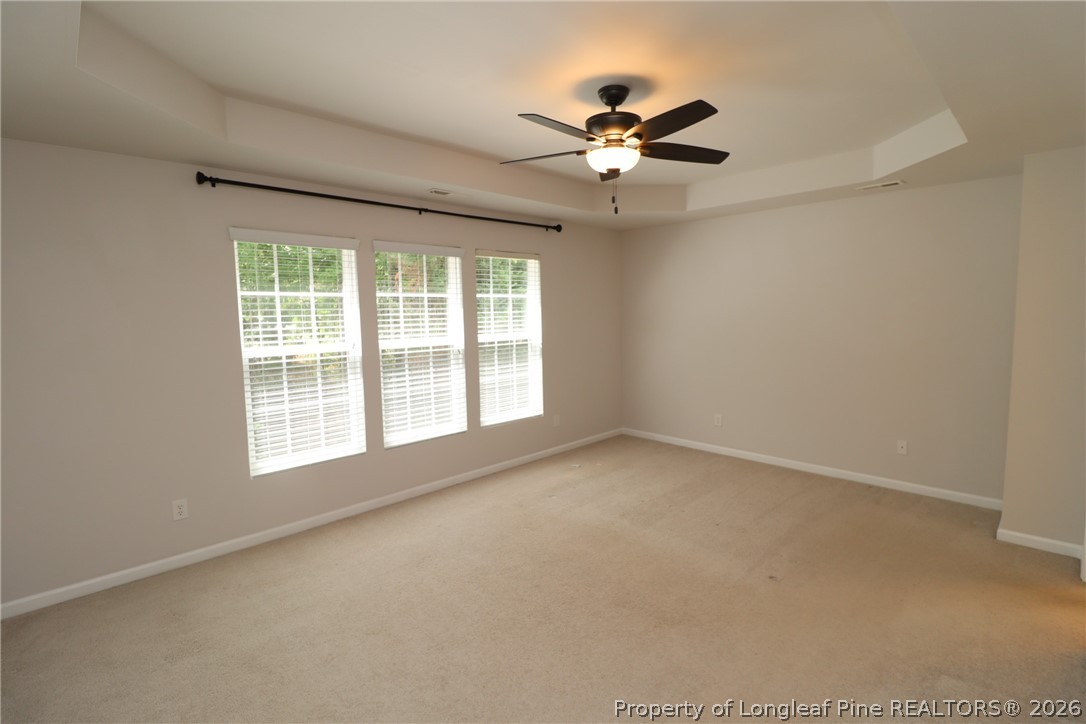 7122 Racine Way Raleigh, NC 27615 - Photo 17 of 32 a view of an empty room with a window