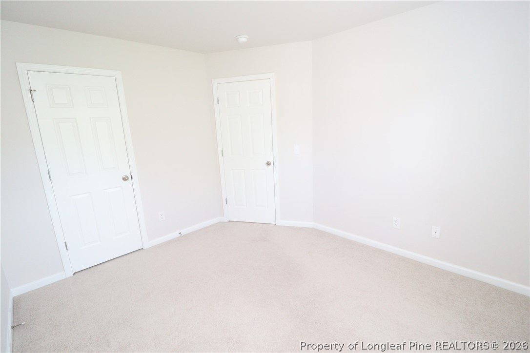 7122 Racine Way Raleigh, NC 27615 - Photo 29 of 32 a view of an empty room