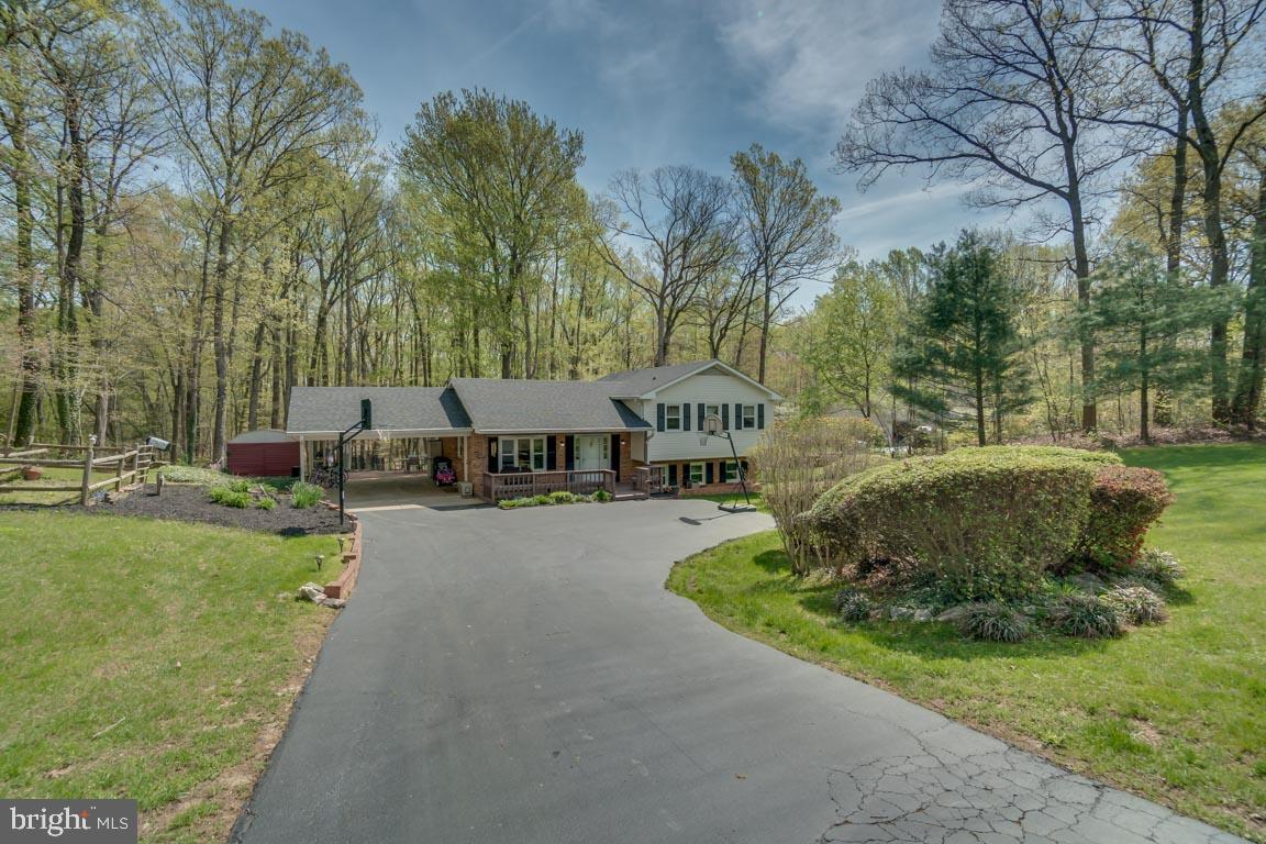 13663 Van Doren Road Manassas, VA 20112 - Photo 2 of 33 a swimming pool with outdoor seating and yard