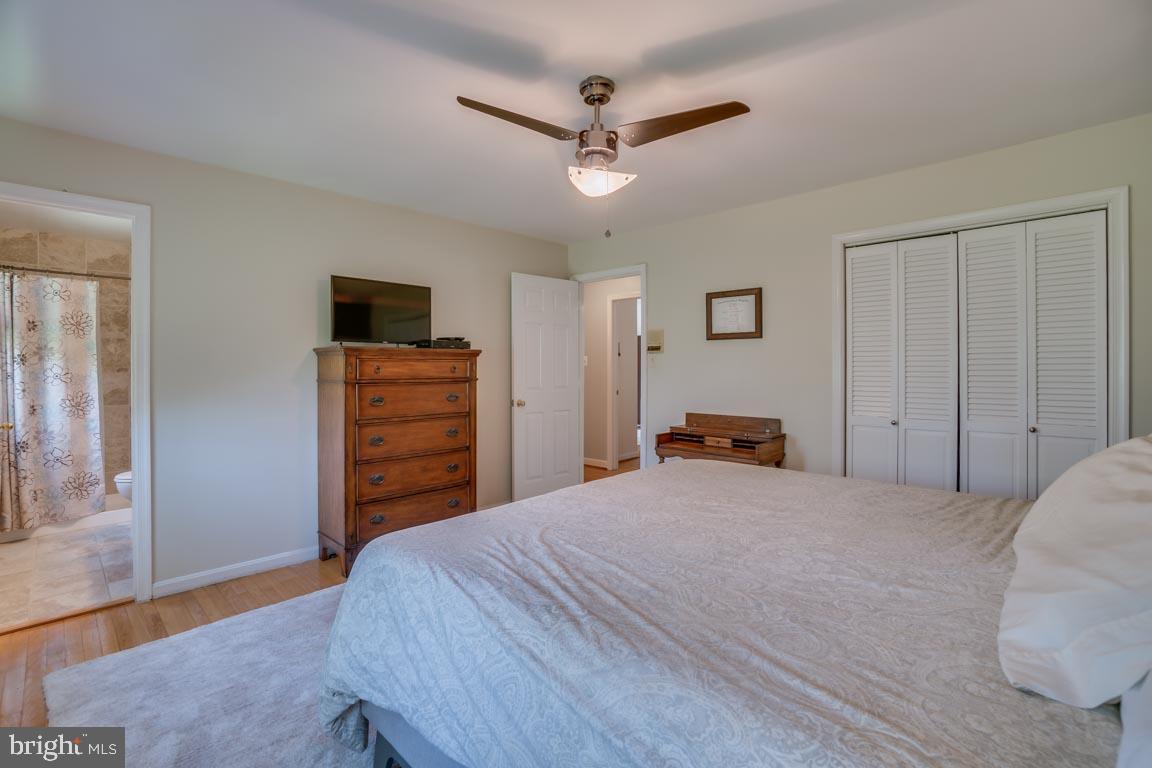 13663 Van Doren Road Manassas, VA 20112 - Photo 15 of 33 a bedroom with a bed and a television