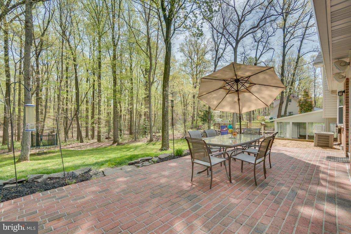 13663 Van Doren Road Manassas, VA 20112 - Photo 28 of 33 a table and chairs in a patio