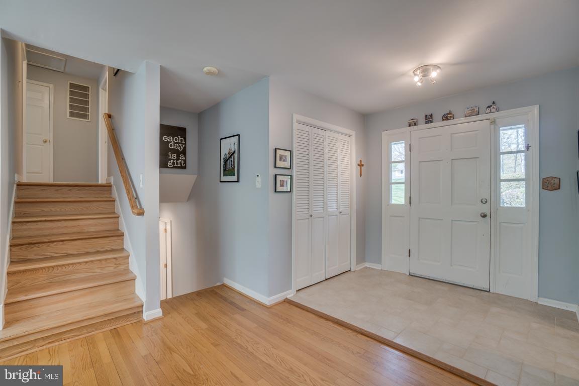 13663 Van Doren Road Manassas, VA 20112 - Photo 5 of 33 a view of entryway with wooden floor and stairs