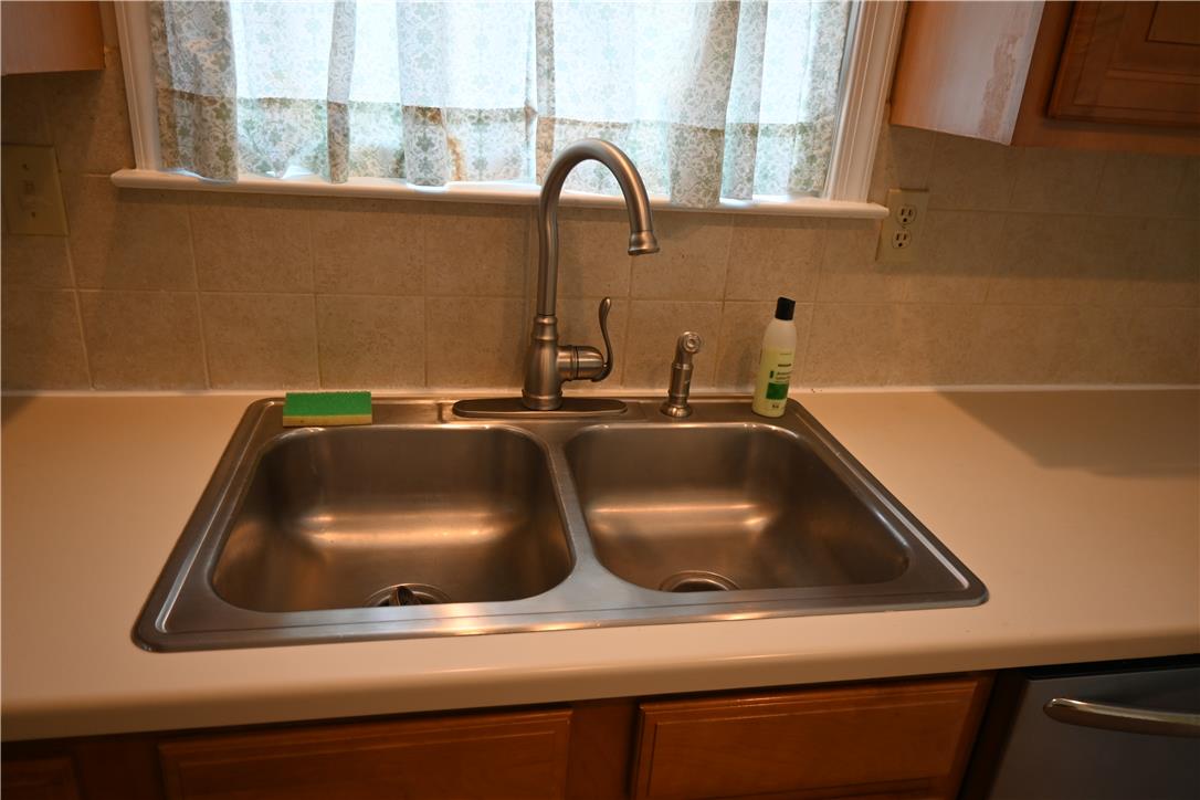 3829 East Hopewell Road Center Valley, PA 18034 - Photo 12 of 52 Functional kitchen with a double basin sink and a convenient gooseneck faucet.