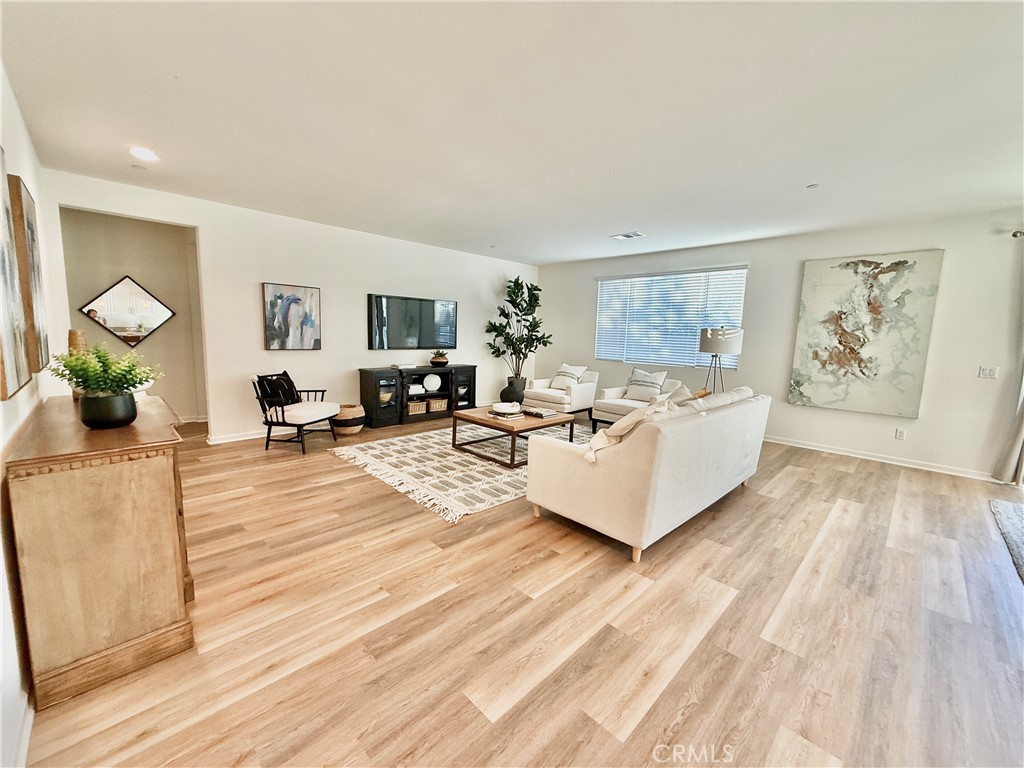 36237 Sunset Ridge Court Wildomar, CA 92595 - Photo 11 of 41 a living room with furniture and wooden floor