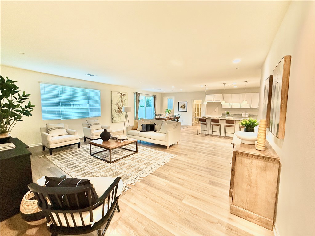 36237 Sunset Ridge Court Wildomar, CA 92595 - Photo 20 of 41 a living room with furniture and a large window
