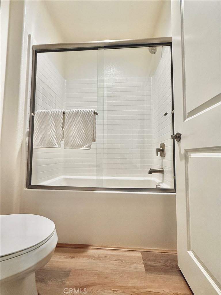 36237 Sunset Ridge Court Wildomar, CA 92595 - Photo 30 of 41 a bathroom with a bathtub and a shower