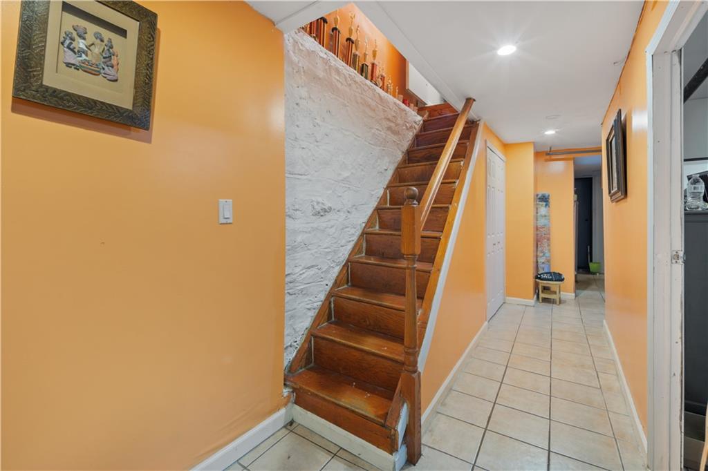 8 Raleigh Place Brooklyn, NY 11226 - Photo 14 of 21 a view of an entryway with staircase