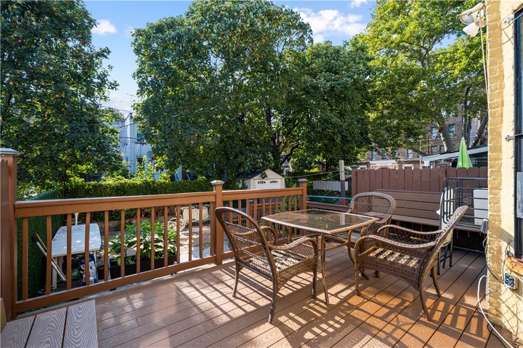 8 Raleigh Place Brooklyn, NY 11226 - Photo 17 of 21 a view of a chairs and table in the roof deck