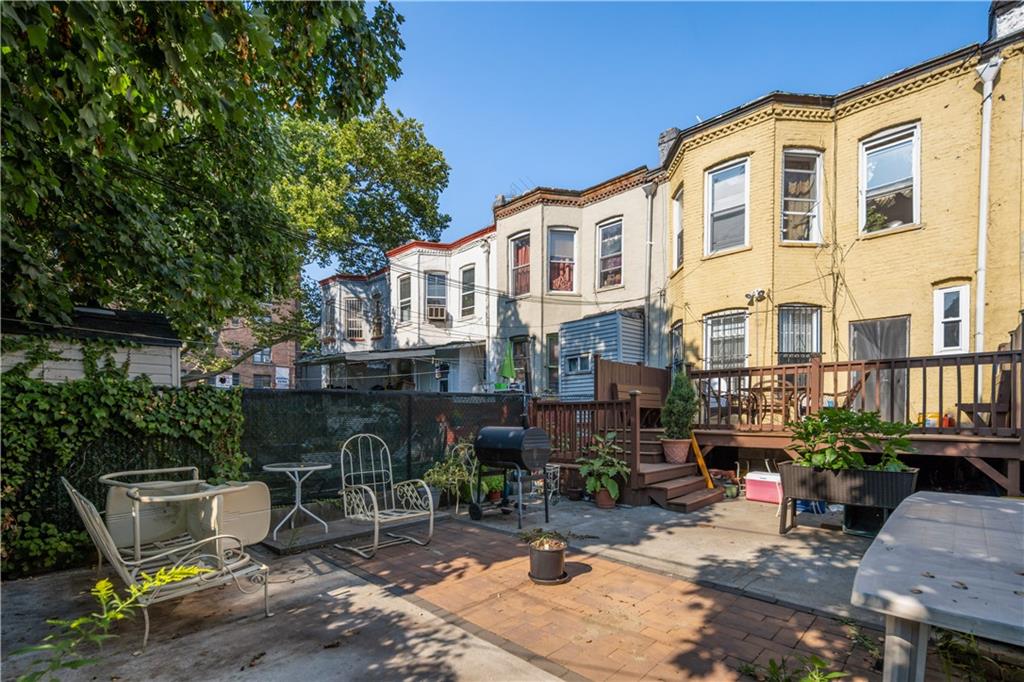 8 Raleigh Place Brooklyn, NY 11226 - Photo 18 of 21 a view of a building with a patio