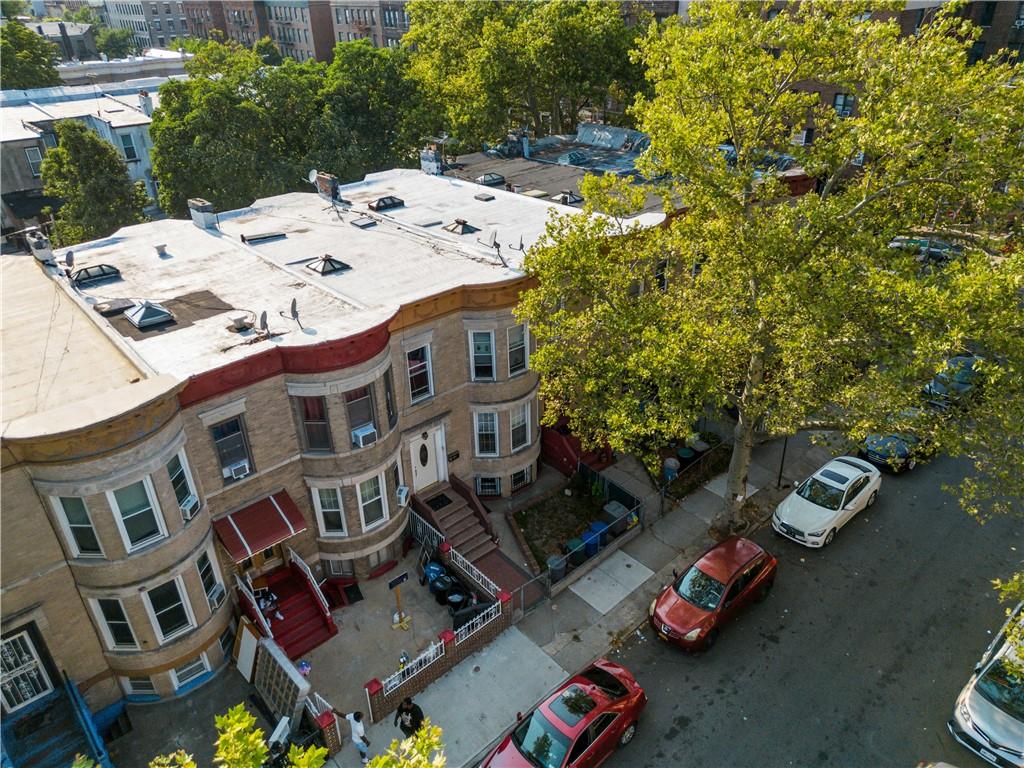 8 Raleigh Place Brooklyn, NY 11226 - Photo 21 of 21 a view of a patio with table and chairs and potted plants