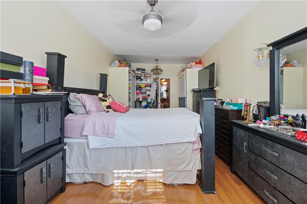 8 Raleigh Place Brooklyn, NY 11226 - Photo 10 of 21 a bed room with a bed and a television