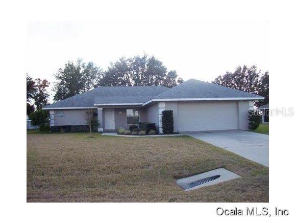5920 Southwest 89th Place Ocala, FL 34476 - Photo 1 of 1 a view of a house with a backyard