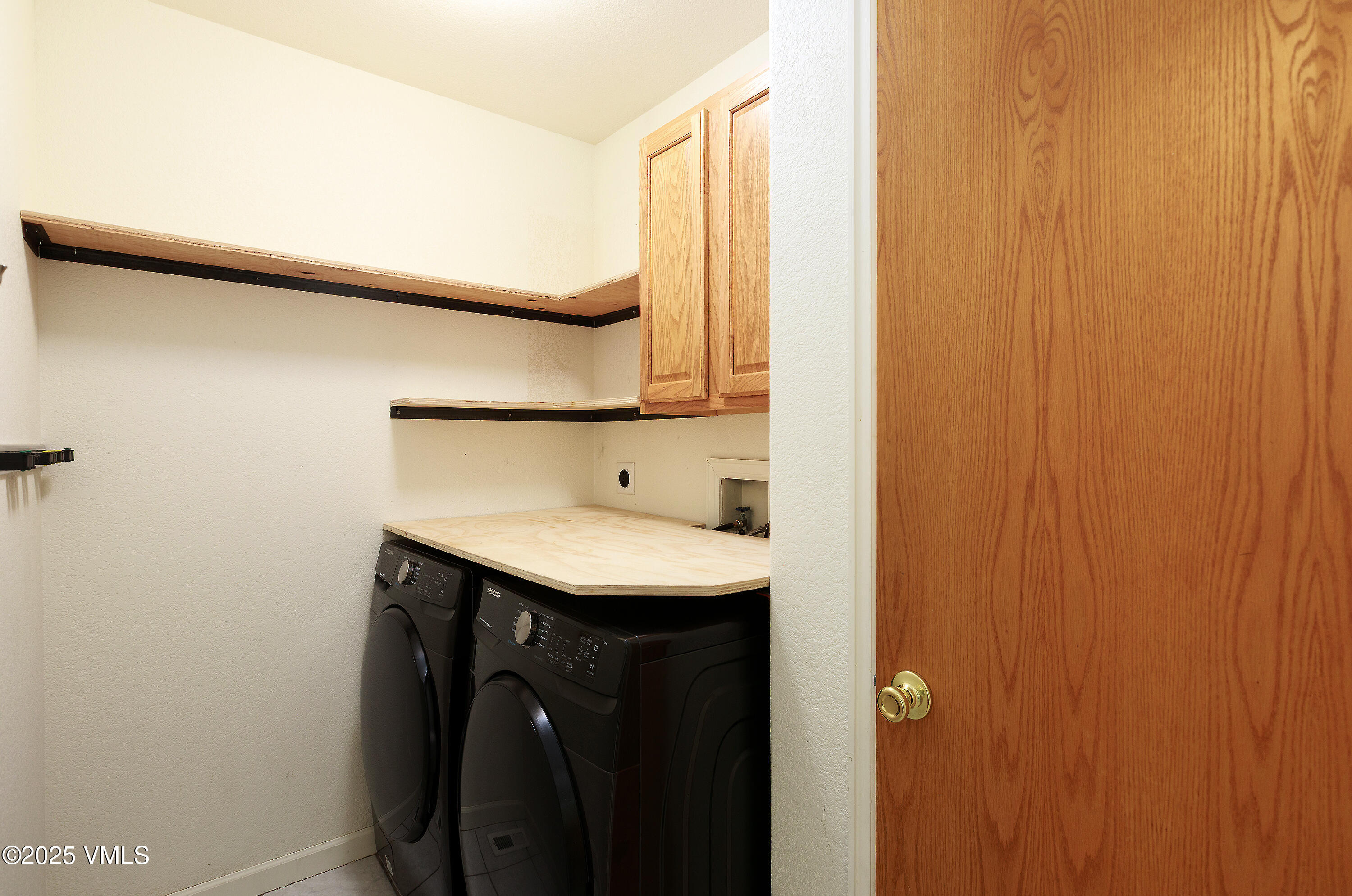 510 Brush Creek Terrace, Unit G3 Eagle, CO 81631 - Photo 14 of 29 a utility room with dryer and washer