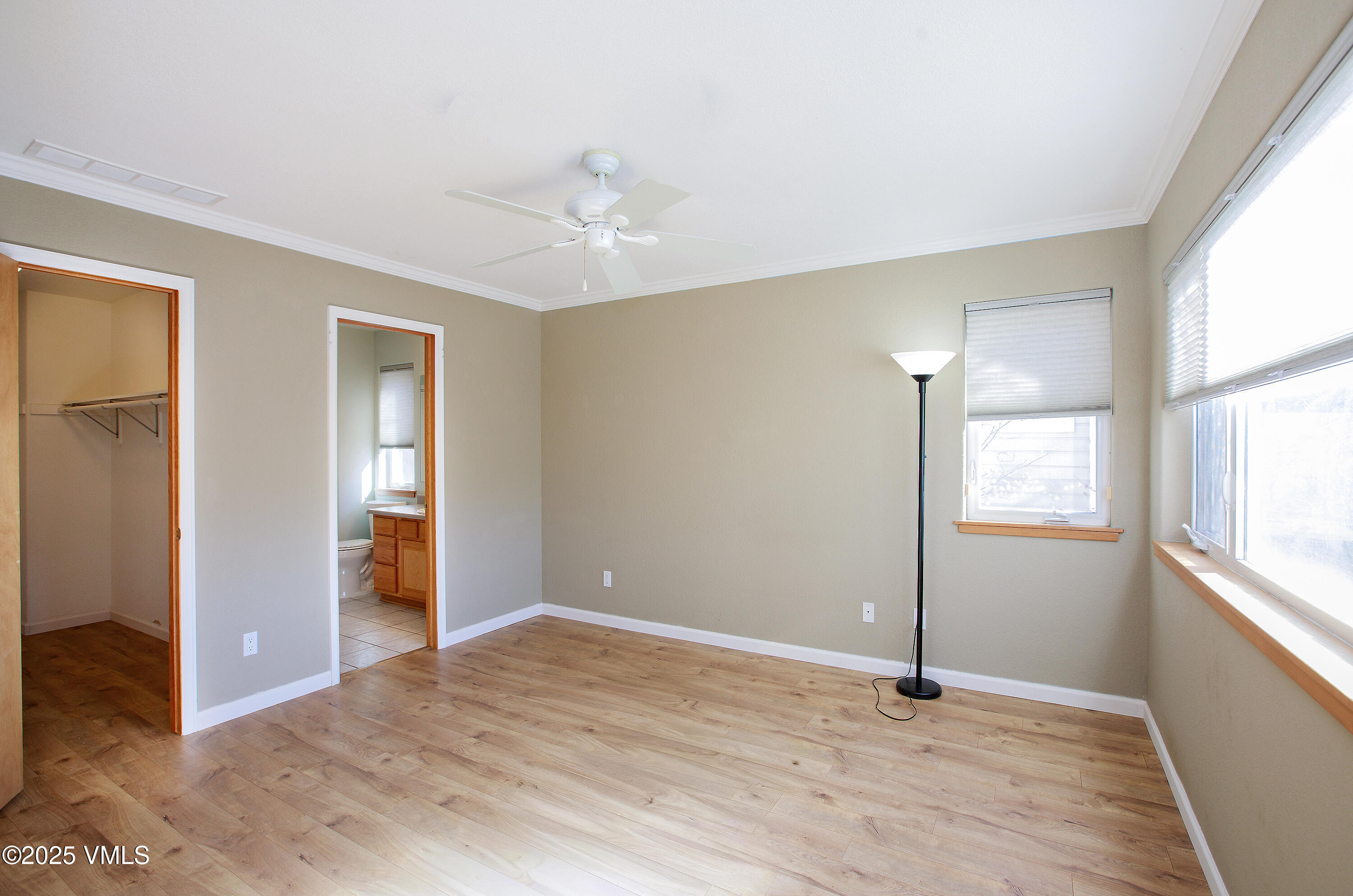 510 Brush Creek Terrace, Unit G3 Eagle, CO 81631 - Photo 16 of 29 a view of an empty room with window and wooden floor