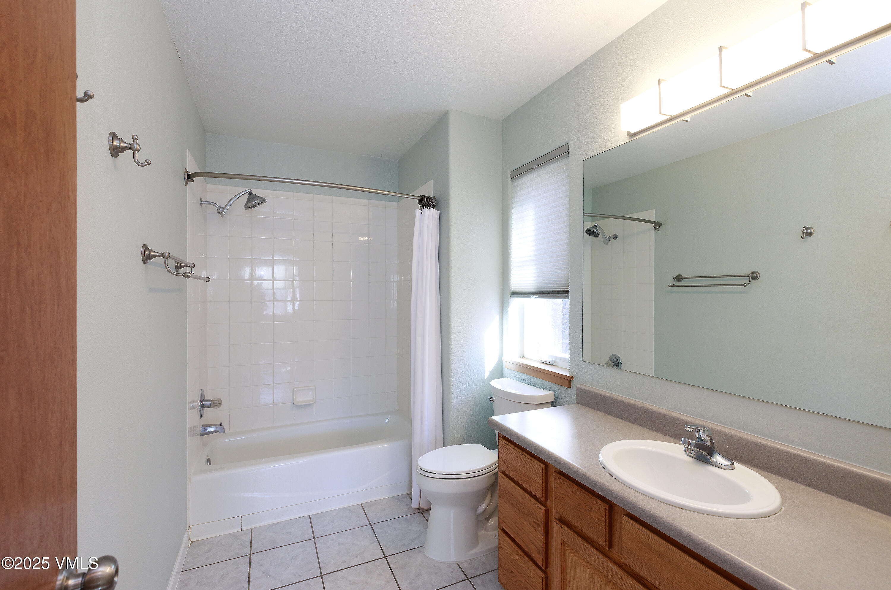 510 Brush Creek Terrace, Unit G3 Eagle, CO 81631 - Photo 19 of 29 a bathroom with a sink toilet tub and shower