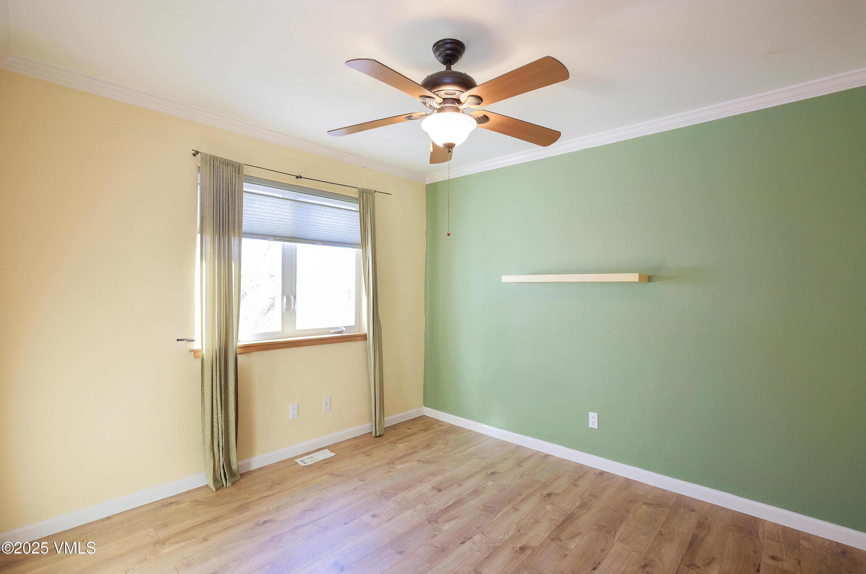 510 Brush Creek Terrace, Unit G3 Eagle, CO 81631 - Photo 26 of 29 a view of an empty room with wooden floor