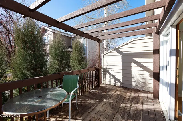 a balcony view with a seating space