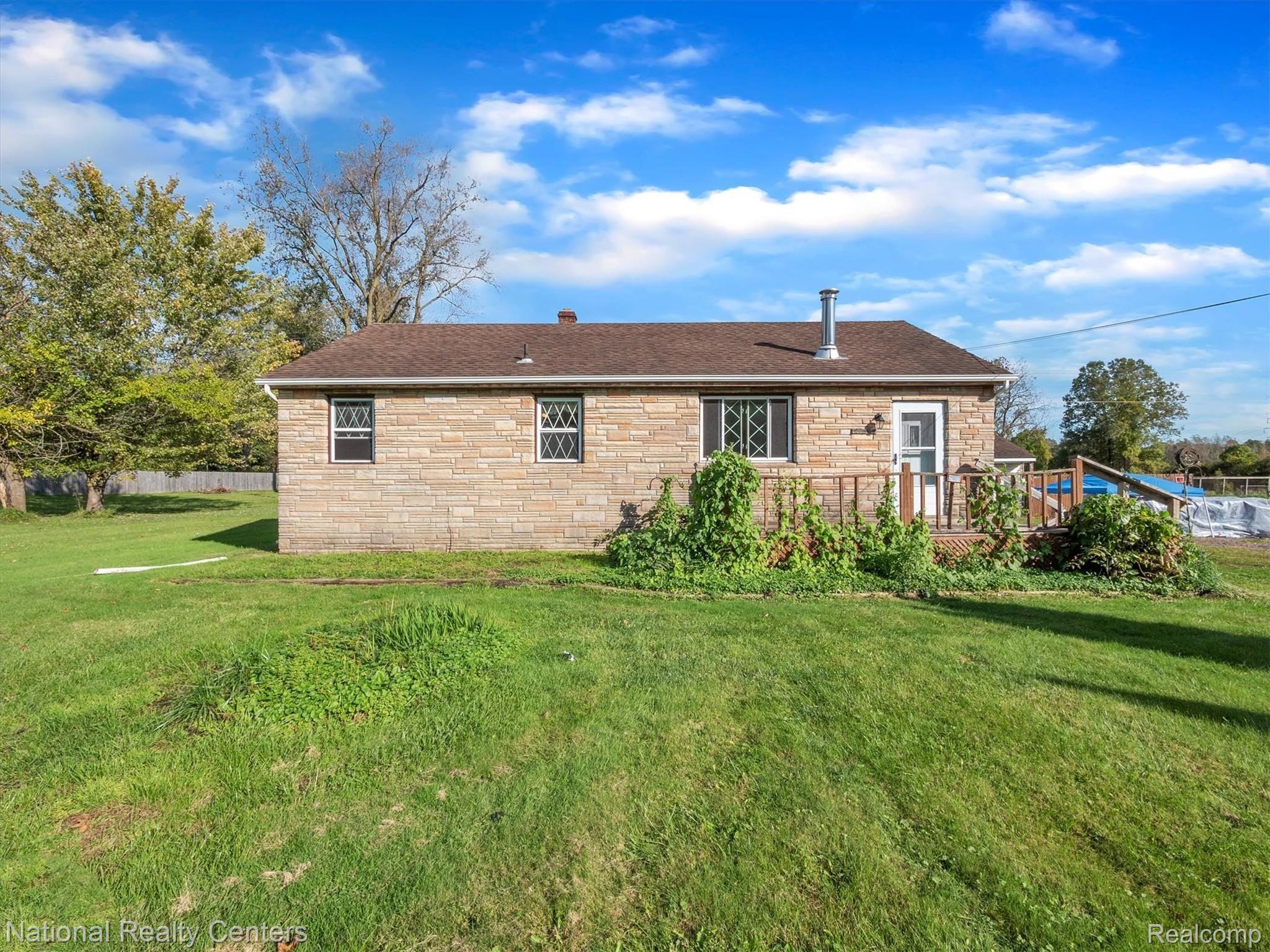 21607 Middlebelt Road New Boston, MI 48164 - Photo 3 of 50 c21607-Middlebelt-WindowStill-Real-Estate-Photography-3.jpg