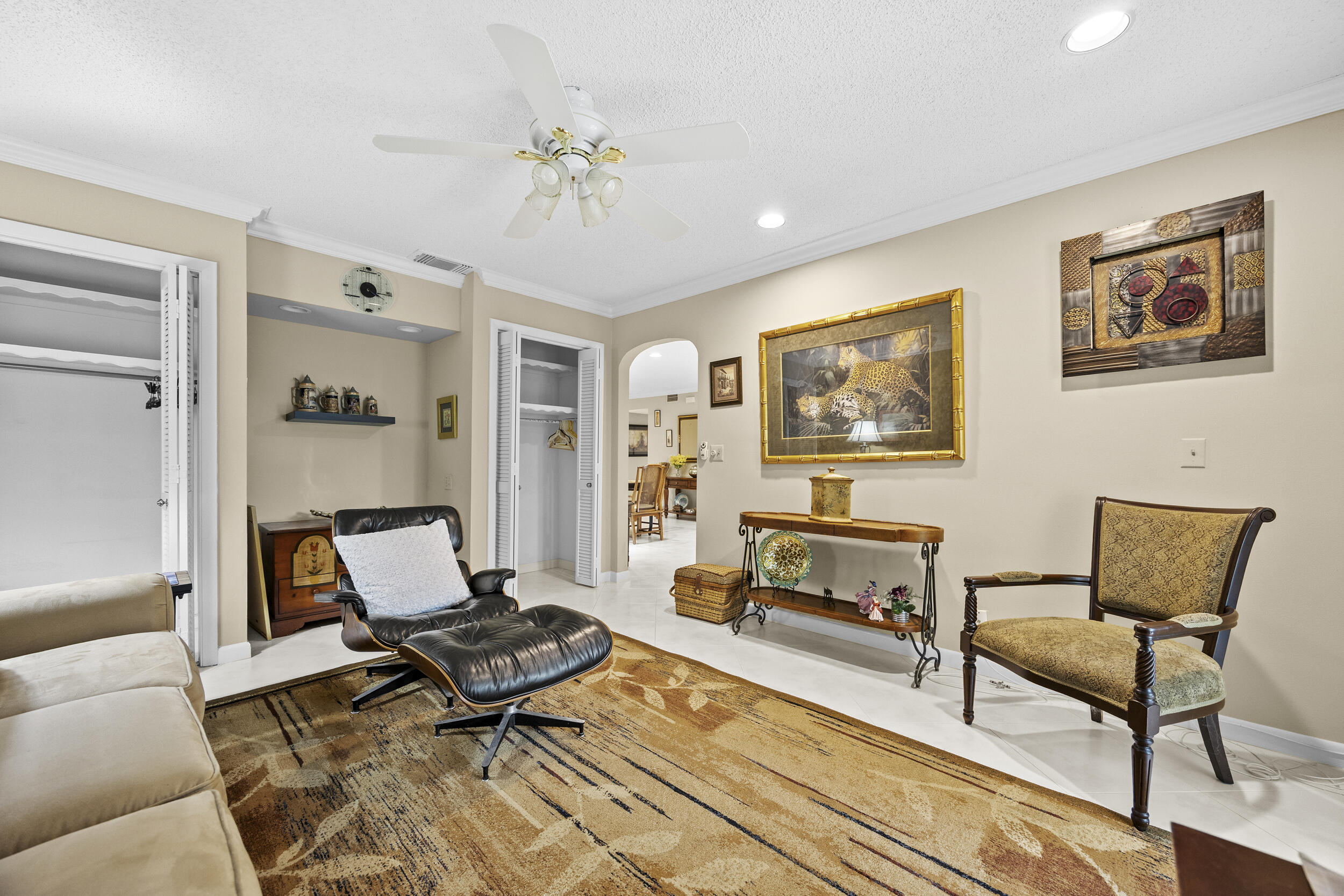 21691 Tall Palm Circle, Unit 3C Boca Raton, FL 33433 - Photo 18 of 48 a living room with furniture a rug and a window