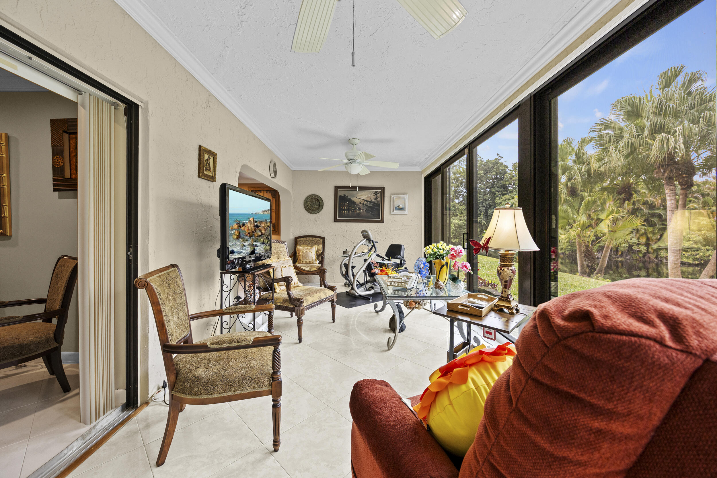 21691 Tall Palm Circle, Unit 3C Boca Raton, FL 33433 - Photo 21 of 48 a living room with furniture and a large window