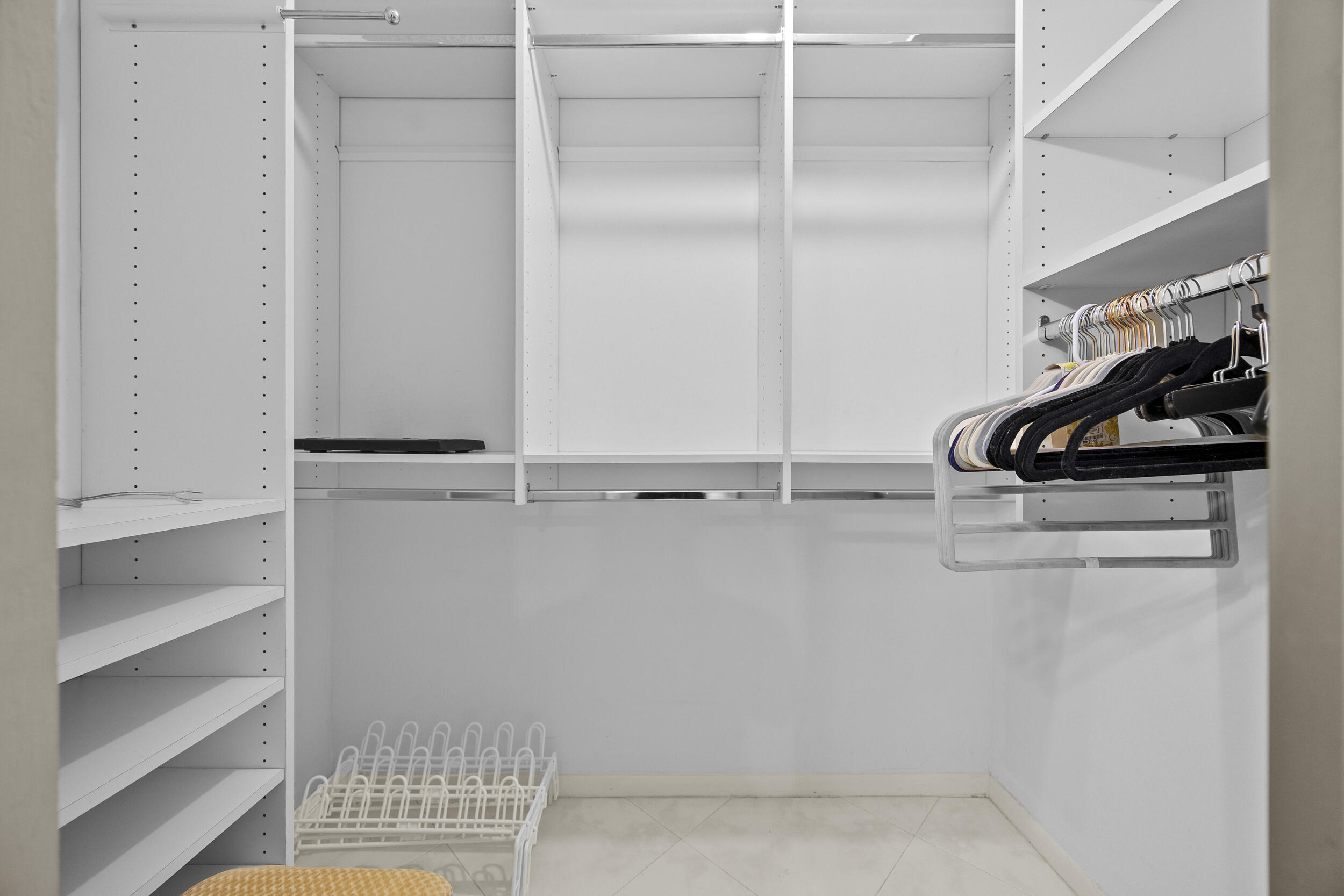 21691 Tall Palm Circle, Unit 3C Boca Raton, FL 33433 - Photo 27 of 48 a view of walk in closet