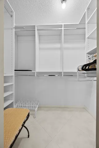 an aerial view of residential houses with outdoor space and swimming pool