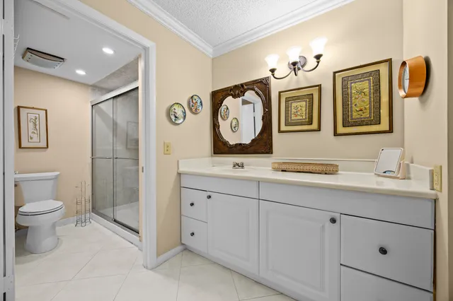 an aerial view of residential houses with outdoor space and river