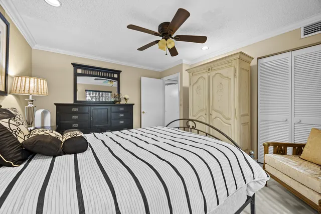 an aerial view of residential house with an outdoor space and seating