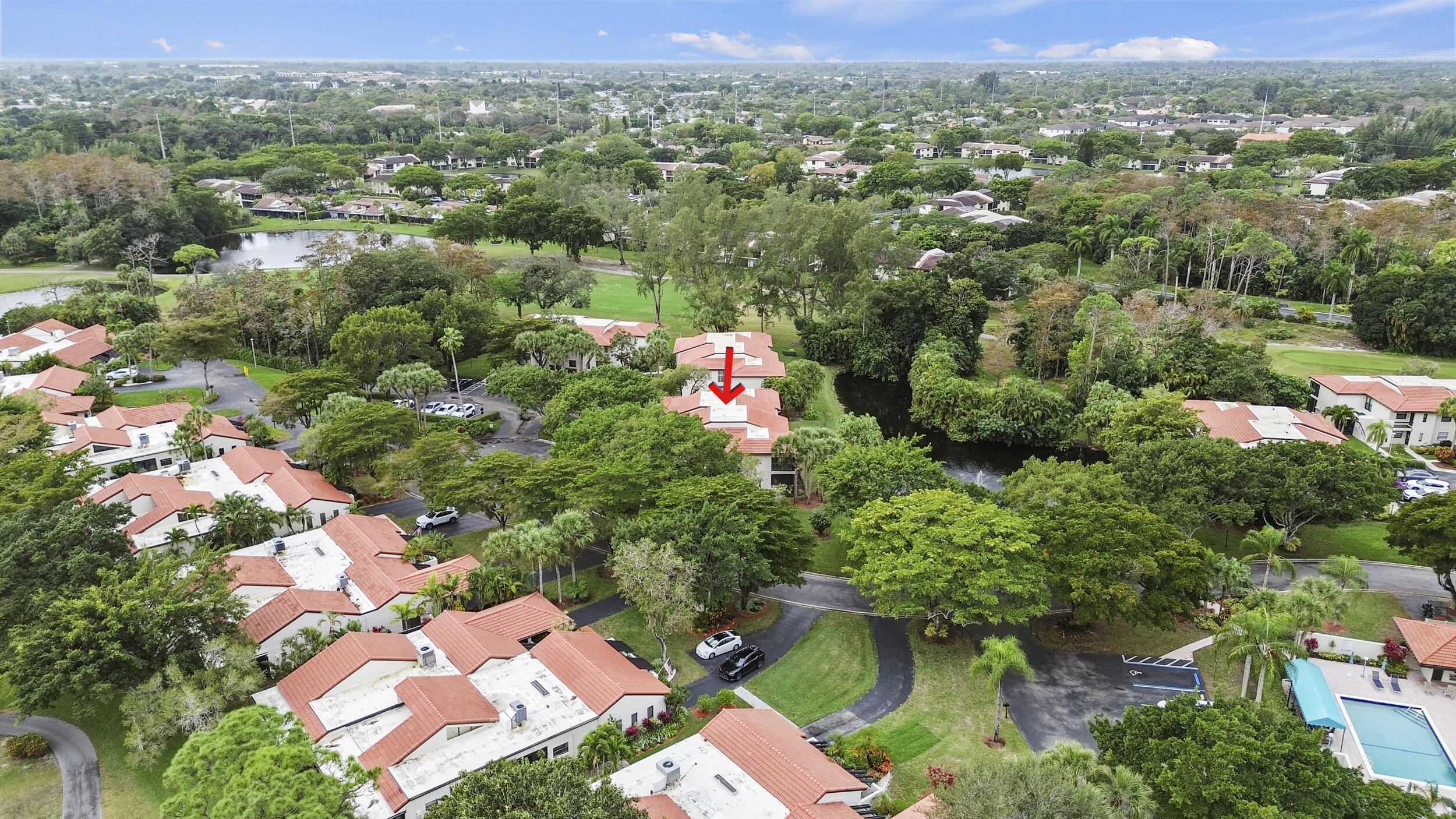 21691 Tall Palm Circle, Unit 3C Boca Raton, FL 33433 - Photo 45 of 48 an aerial view of residential houses with outdoor space and trees