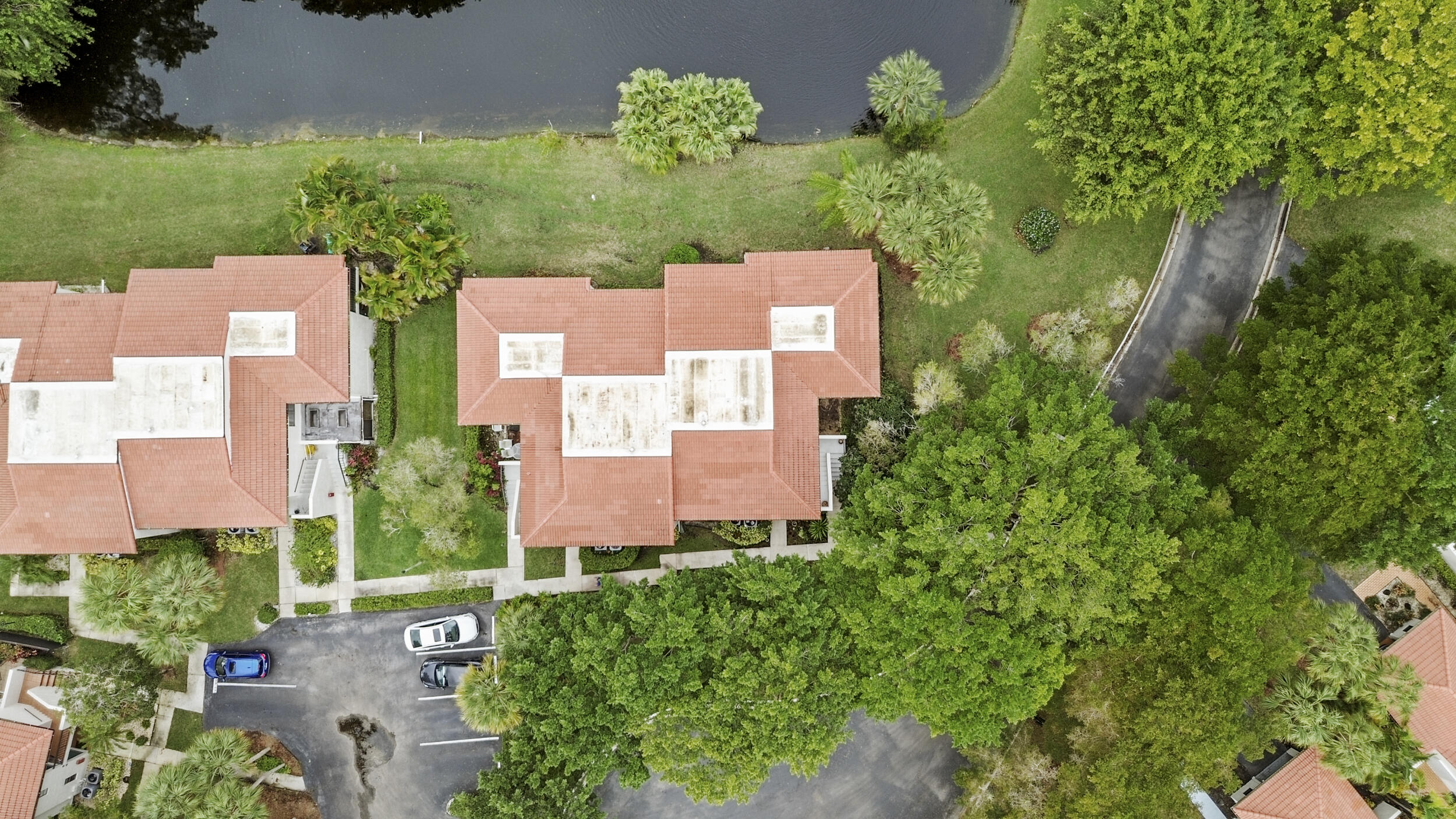 21691 Tall Palm Circle, Unit 3C Boca Raton, FL 33433 - Photo 47 of 48 an aerial view of residential house with an outdoor space and seating