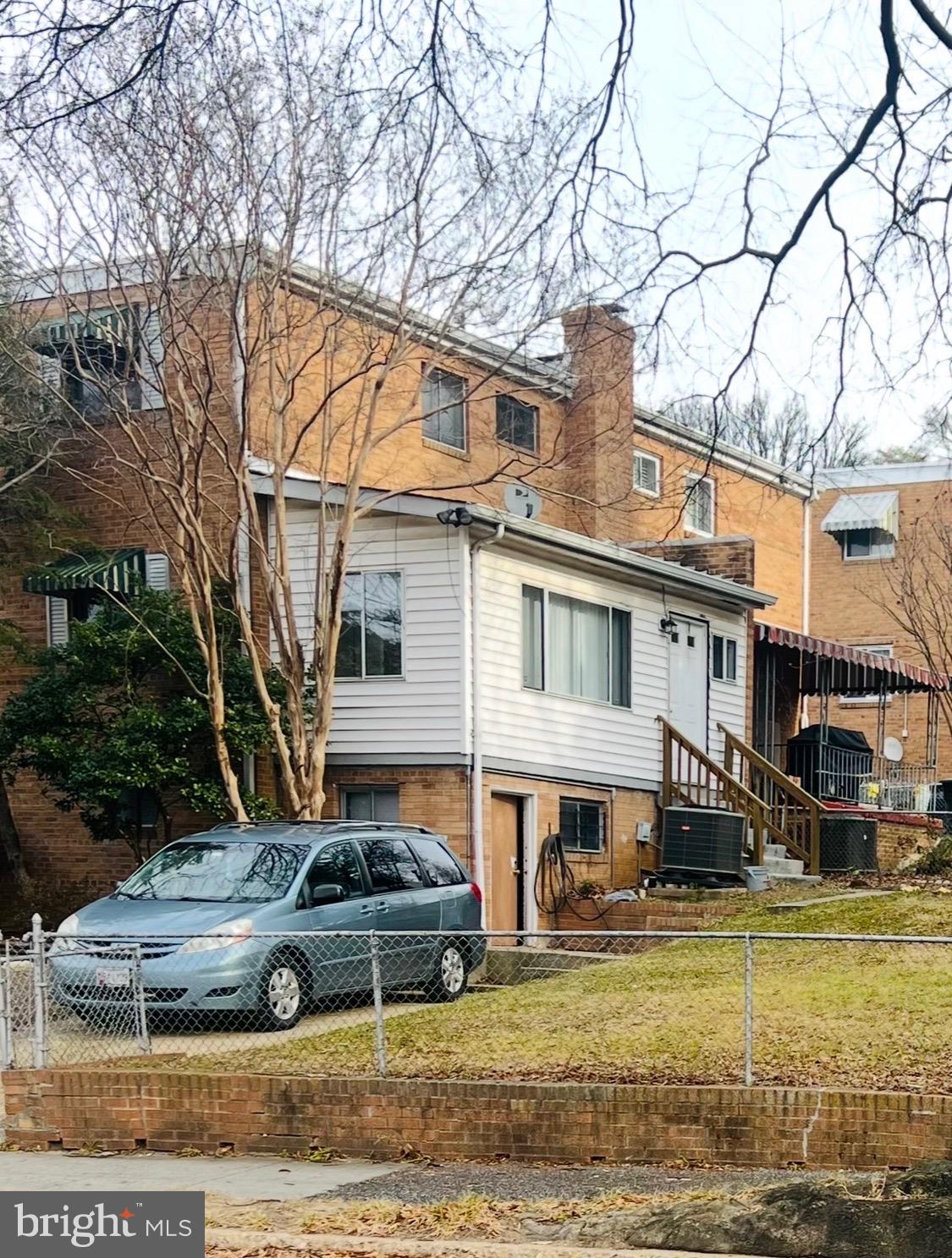 4901 Fitch Place Northeast Washington, DC 20019 - Photo 45 of 47 a front view of a house with a yard