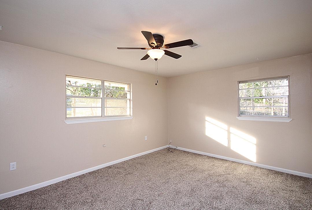 5643 Old Bethel Road Crestview, FL 32536 - Photo 17 of 23 a view of an empty room with a window
