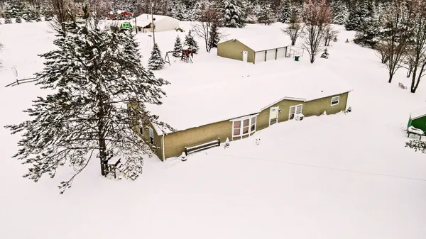 $430,000 | 4395 North Raymond Road, Luther, MI 49656