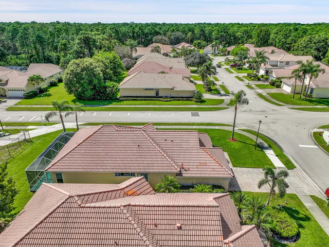 an aerial view of a house with a garden