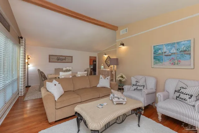 a kitchen with sink cabinets and window