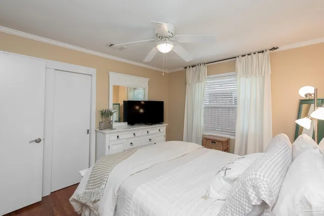 a view of backyard with outdoor seating a patio and plants