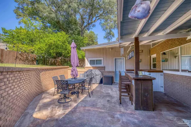 a view of a swimming pool with a backyard