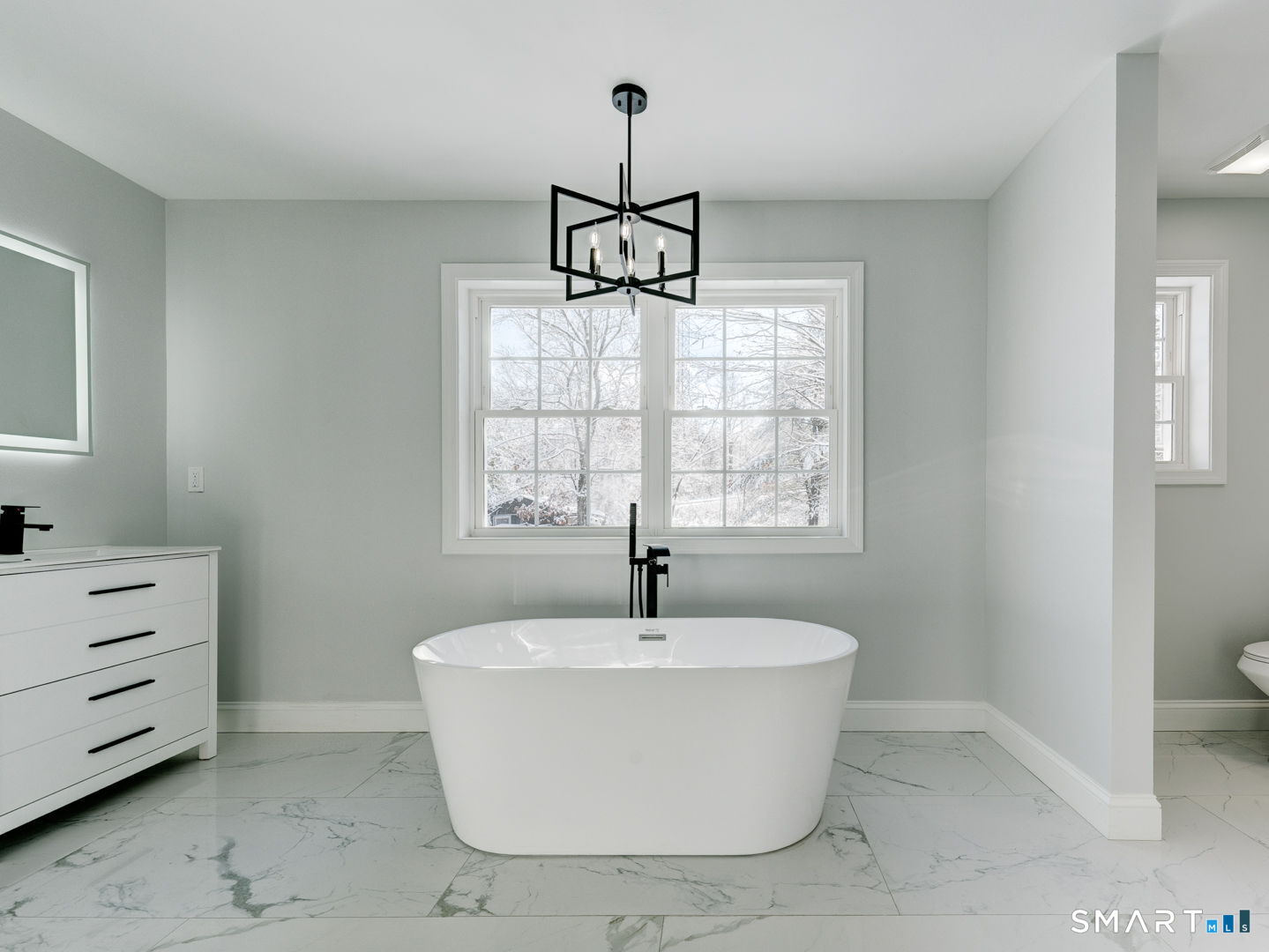 368 Reservoir Road New Britain, CT 06052 - Photo 16 of 32 a white bath tub sitting in a bathroom next to a window