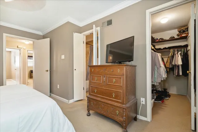 a view of a livingroom with furniture and a flat screen tv