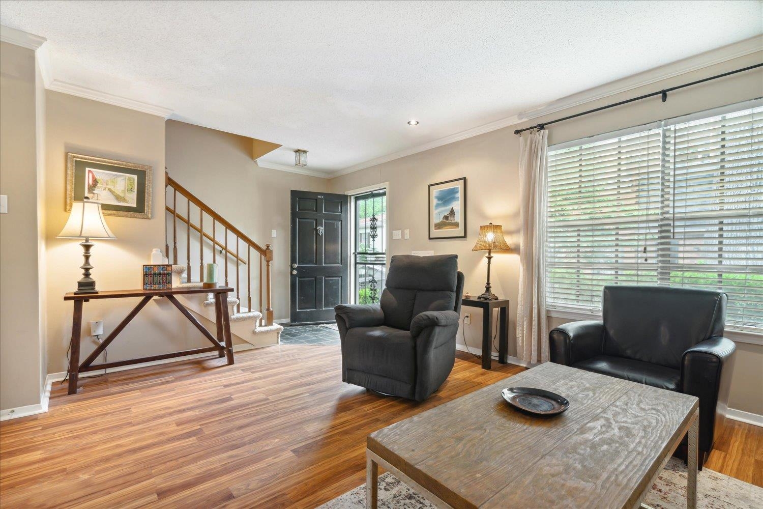435 North Highland Street, Unit 2 Memphis, TN 38122 - Photo 2 of 26 a living room with furniture and a wooden floor