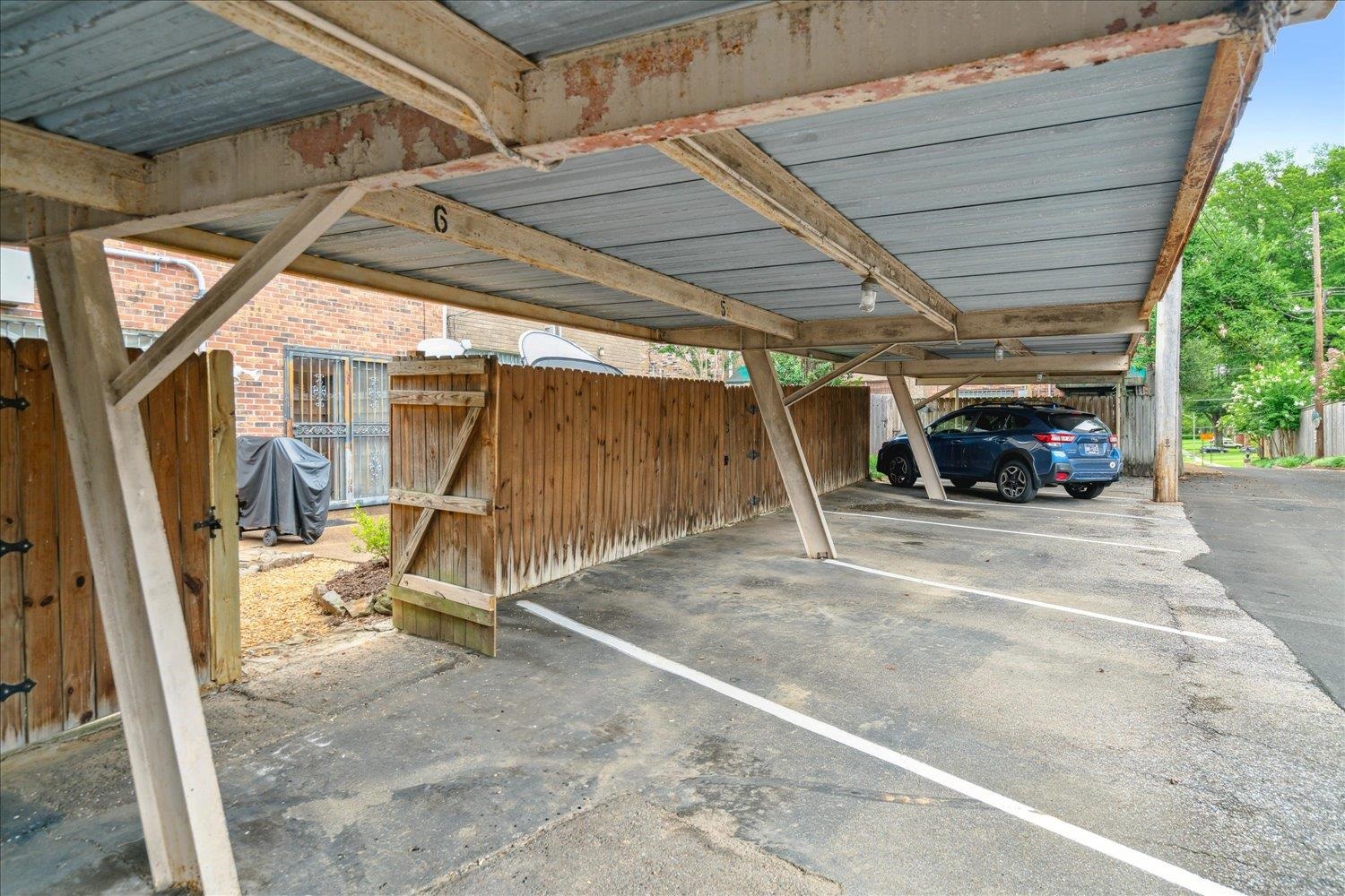 435 North Highland Street, Unit 2 Memphis, TN 38122 - Photo 22 of 26 View of parking featuring a carport