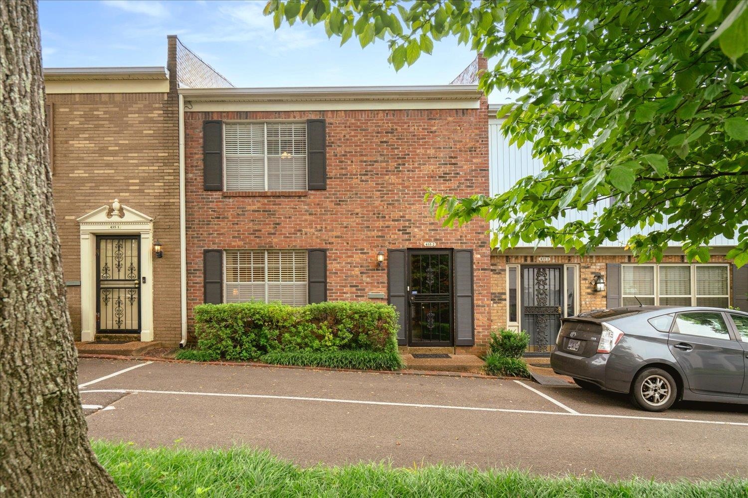 435 North Highland Street, Unit 2 Memphis, TN 38122 - Photo 3 of 26 a view of a car parked front of a house