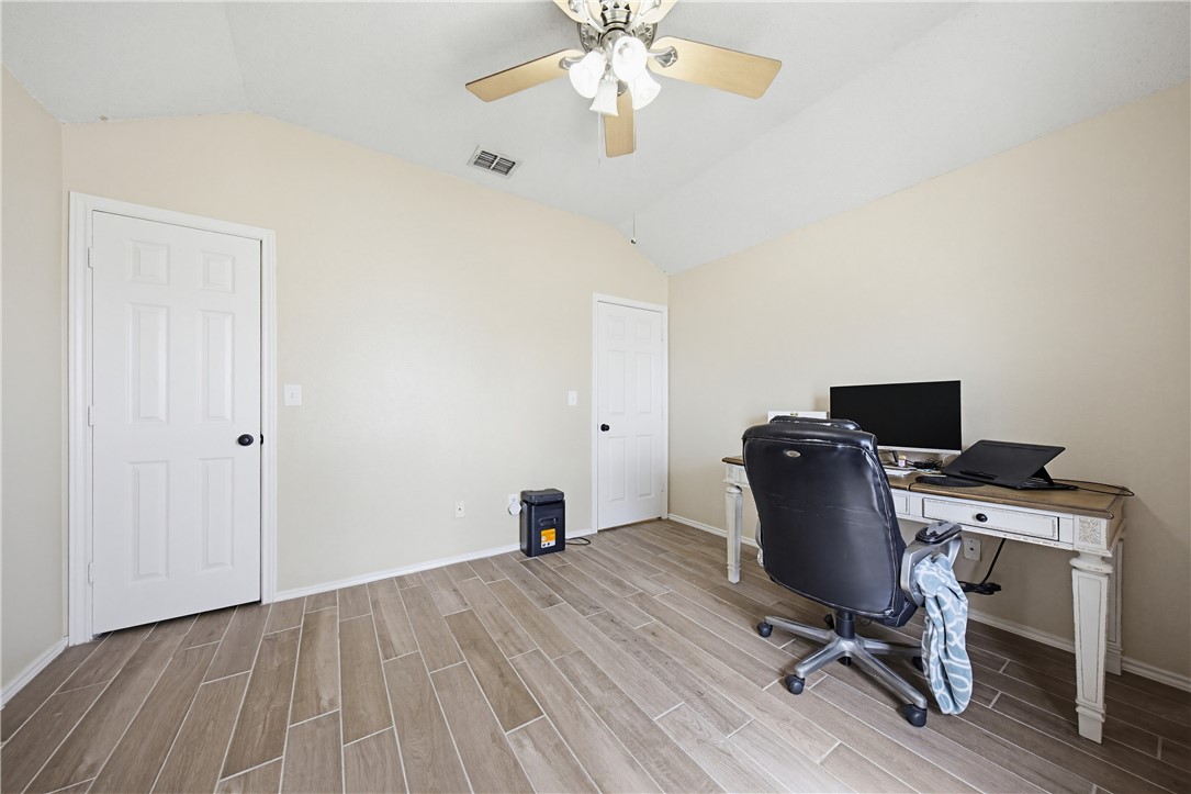 1004 La Mirada Portland, TX 78374 - Photo 15 of 23 a view of a workspace with furniture and wooden floor