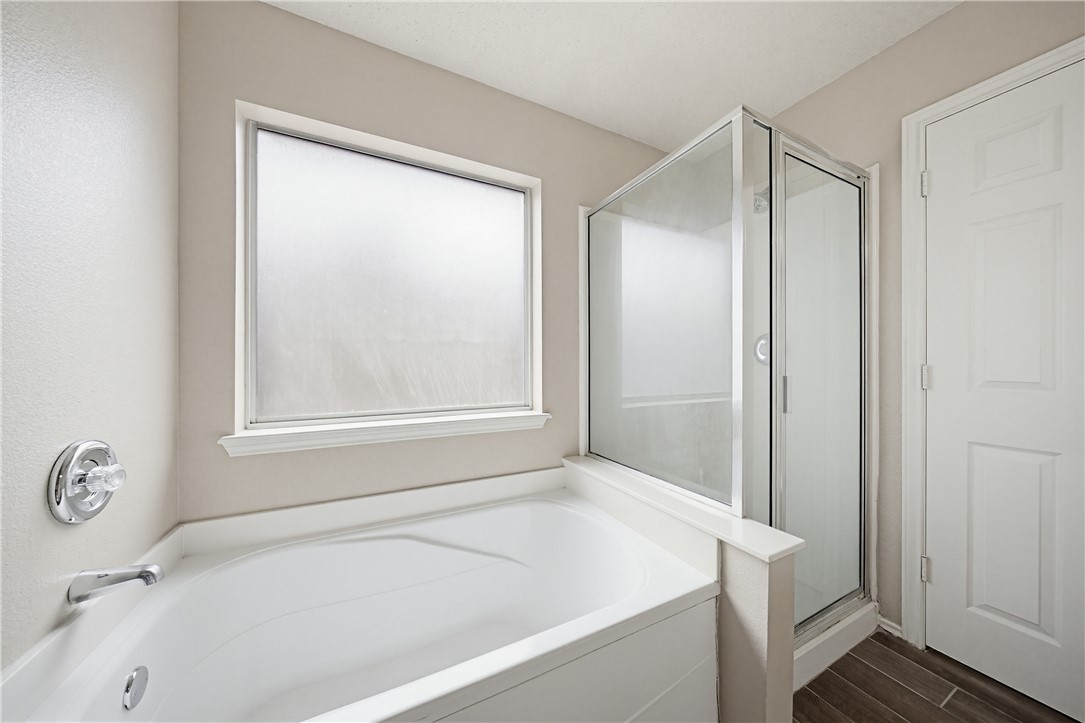 1004 La Mirada Portland, TX 78374 - Photo 18 of 23 a white bath tub sitting next to a window