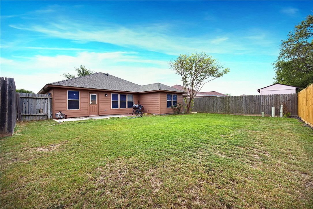 1004 La Mirada Portland, TX 78374 - Photo 22 of 23 a front view of a house with garden