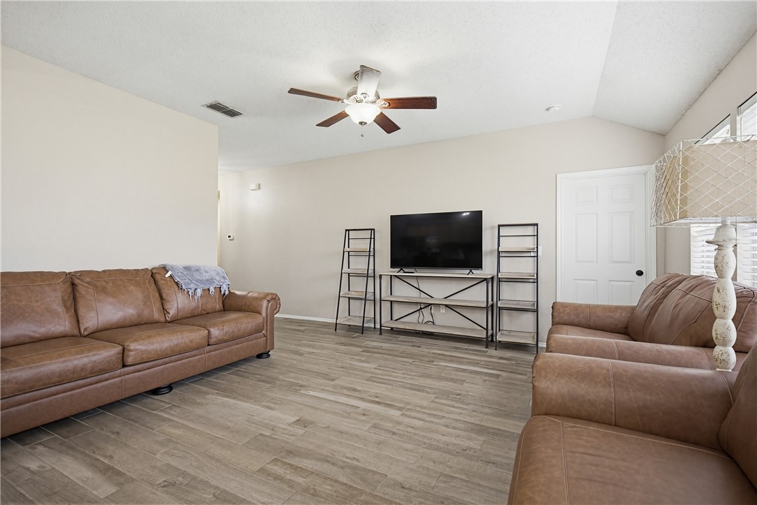1004 La Mirada Portland, TX 78374 - Photo 6 of 23 a living room with furniture and a flat screen tv